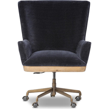 Bernardo Desk Chair by Four Hands in monte navy, brushed brass, weathered oak. Made from 50% viscose, 50% wool, iron, solid oak in a modern style.