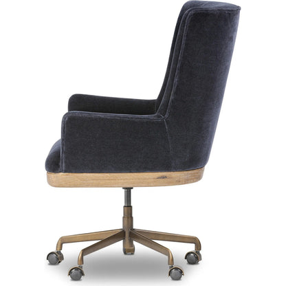 Bernardo Desk Chair by Four Hands in monte navy, brushed brass, weathered oak. Made from 50% viscose, 50% wool, iron, solid oak in a modern style.