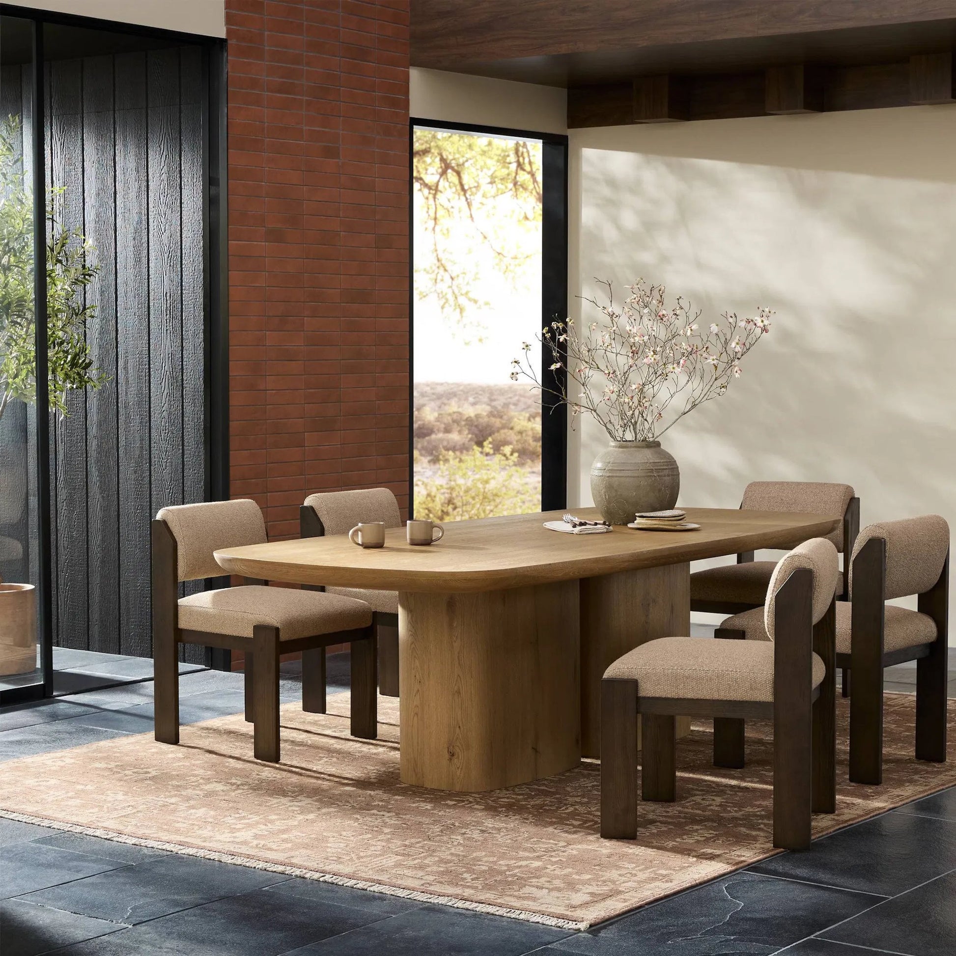 Barto Dining Table by Four Hands in aged smoked oak veneer. Made from thick oak veneer, solid oak in a transitional style.