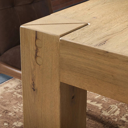 Emmer Dining Table by Four Hands in aged smoked oak, aged smoked oak veneer. Made from solid oak, thick oak veneer in a transitional style.