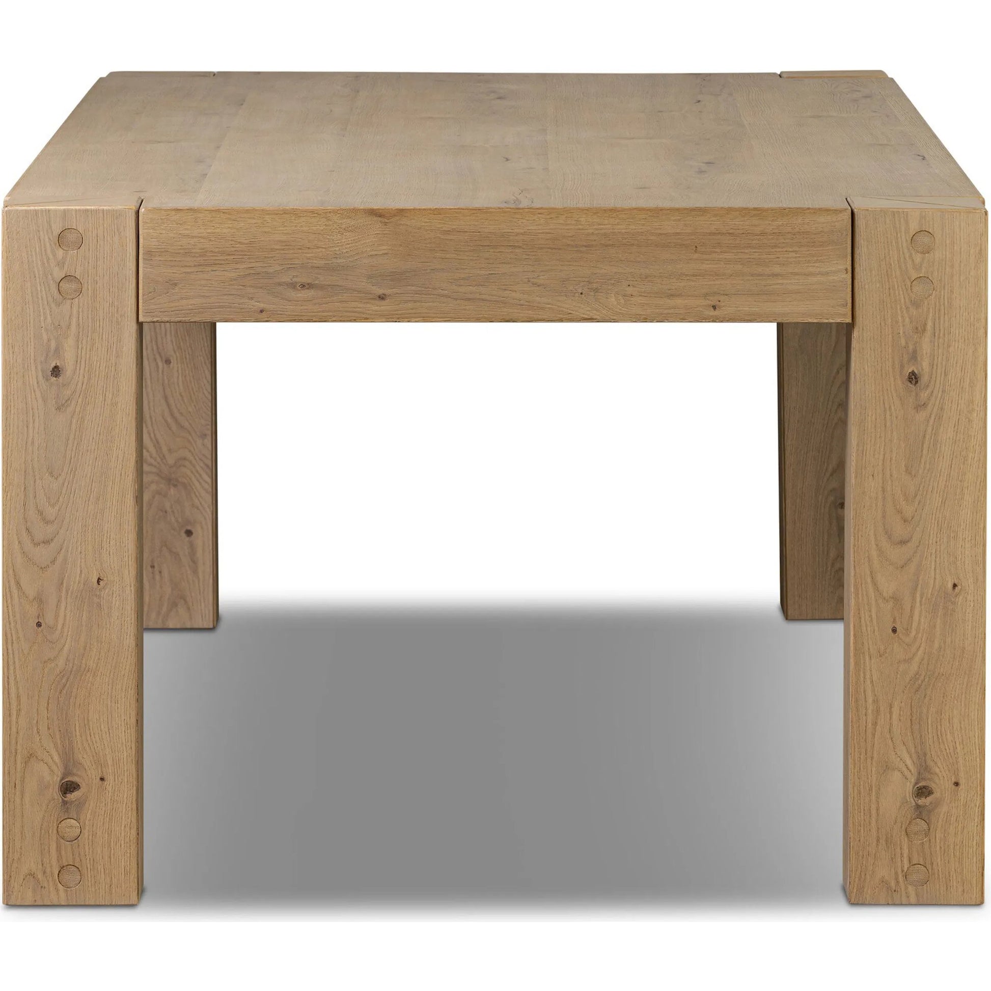 Emmer Dining Table by Four Hands in aged smoked oak, aged smoked oak veneer. Made from solid oak, thick oak veneer in a transitional style.