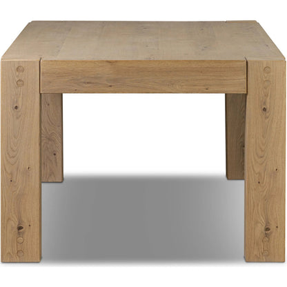 Emmer Dining Table by Four Hands in aged smoked oak, aged smoked oak veneer. Made from solid oak, thick oak veneer in a transitional style.