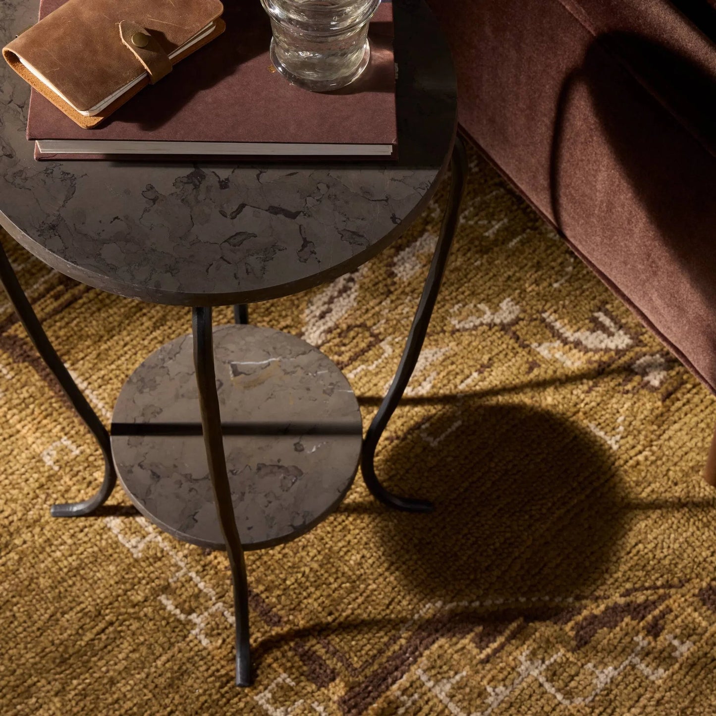 009 SI-2531671 | Lifestyle | Nina End Table by Four Hands in grey italian marble, hammered gunmetal. Made from solid marble, iron in a unique style.