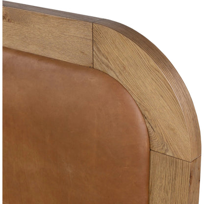 Rane Bed by Four Hands in heirloom sienna, honey brown oak veneer, honey brown oak. Made from top grain leather, thick oak veneer, solid oak in a transitional style.