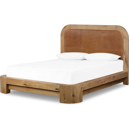 Rane Bed by Four Hands in heirloom sienna, honey brown oak veneer, honey brown oak. Made from top grain leather, thick oak veneer, solid oak in a transitional style.
