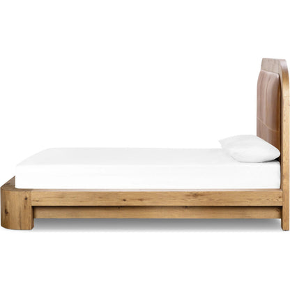 Rane Bed by Four Hands in heirloom sienna, honey brown oak veneer, honey brown oak. Made from top grain leather, thick oak veneer, solid oak in a transitional style.