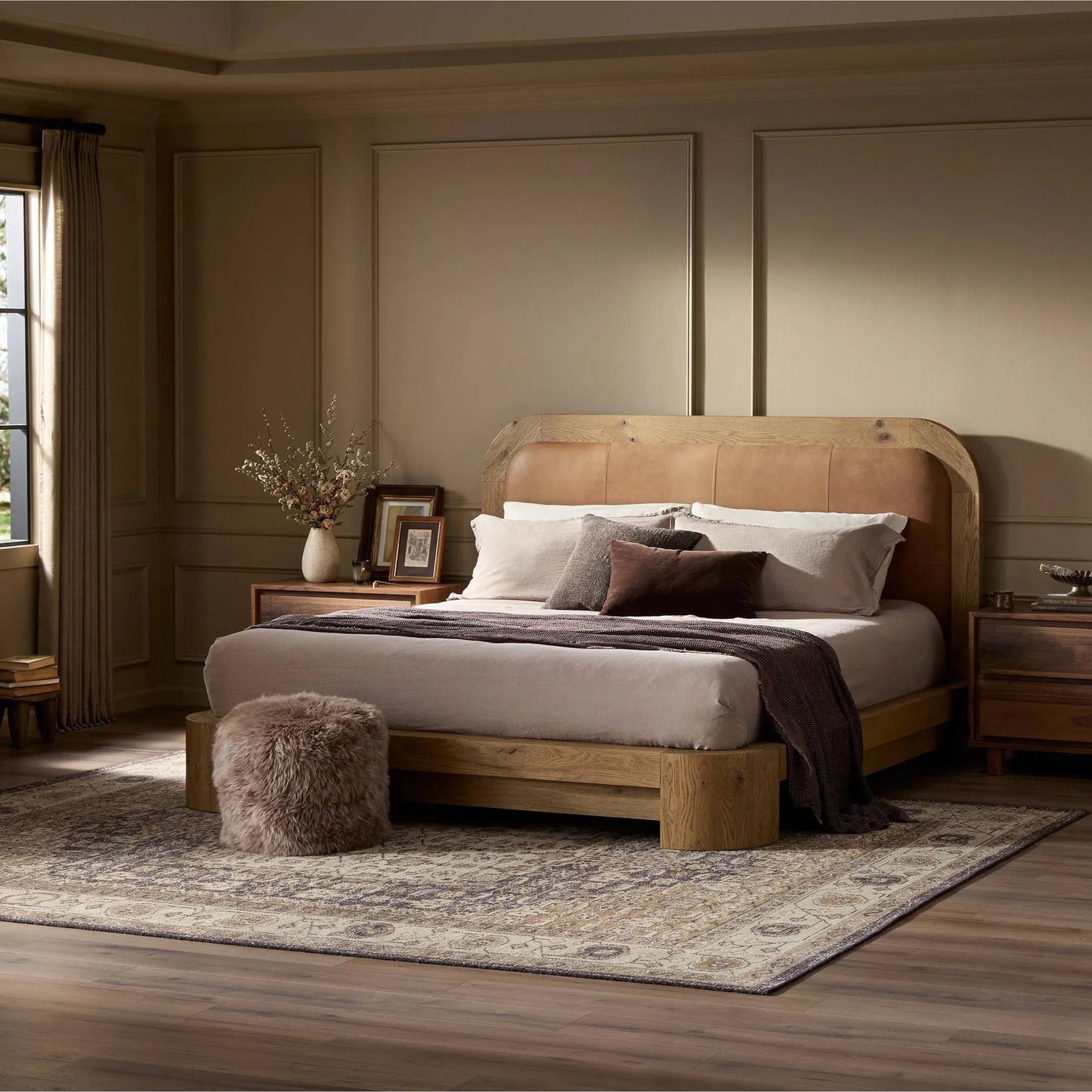 015 SI-2446644,SI-2446645 | Lifestyle | Rane Bed by Four Hands in heirloom sienna, honey brown oak veneer, honey brown oak. Made from top grain leather, thick oak veneer, solid oak in a transitional style.