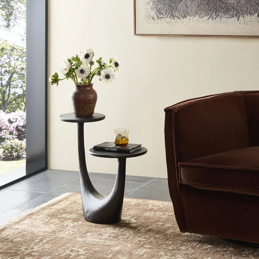 Torrid End Table by Four Hands in distressed bronze. Made from aluminum in a unique style.