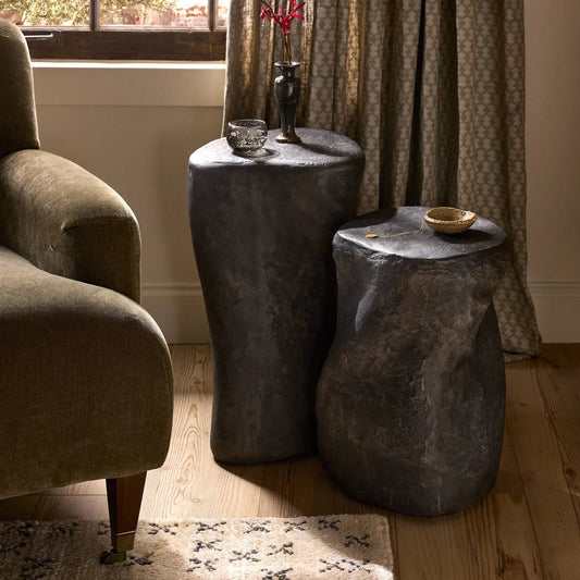 Bomba Small End Table by Four Hands in textured black concrete. Made from solid concrete in a unique style.