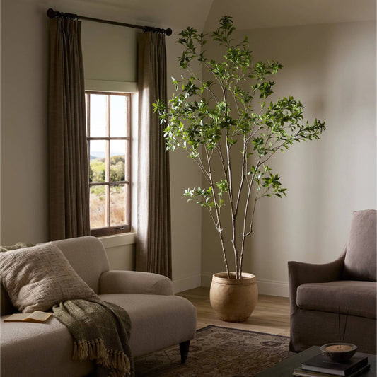 Faux Pieris Tree by Four Hands in faux pieris tree. Made from 55% polyvinyl chloride (pvc), 45% polyethylene in a unique style.