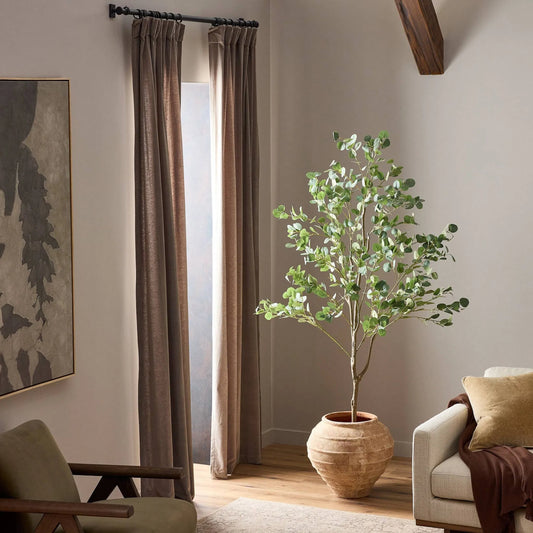 Faux Eucalyptus Tree by Four Hands in faux eucalyptus tree. Made from 55% polyvinyl chloride (pvc), 45% polyethylene in a unique style.