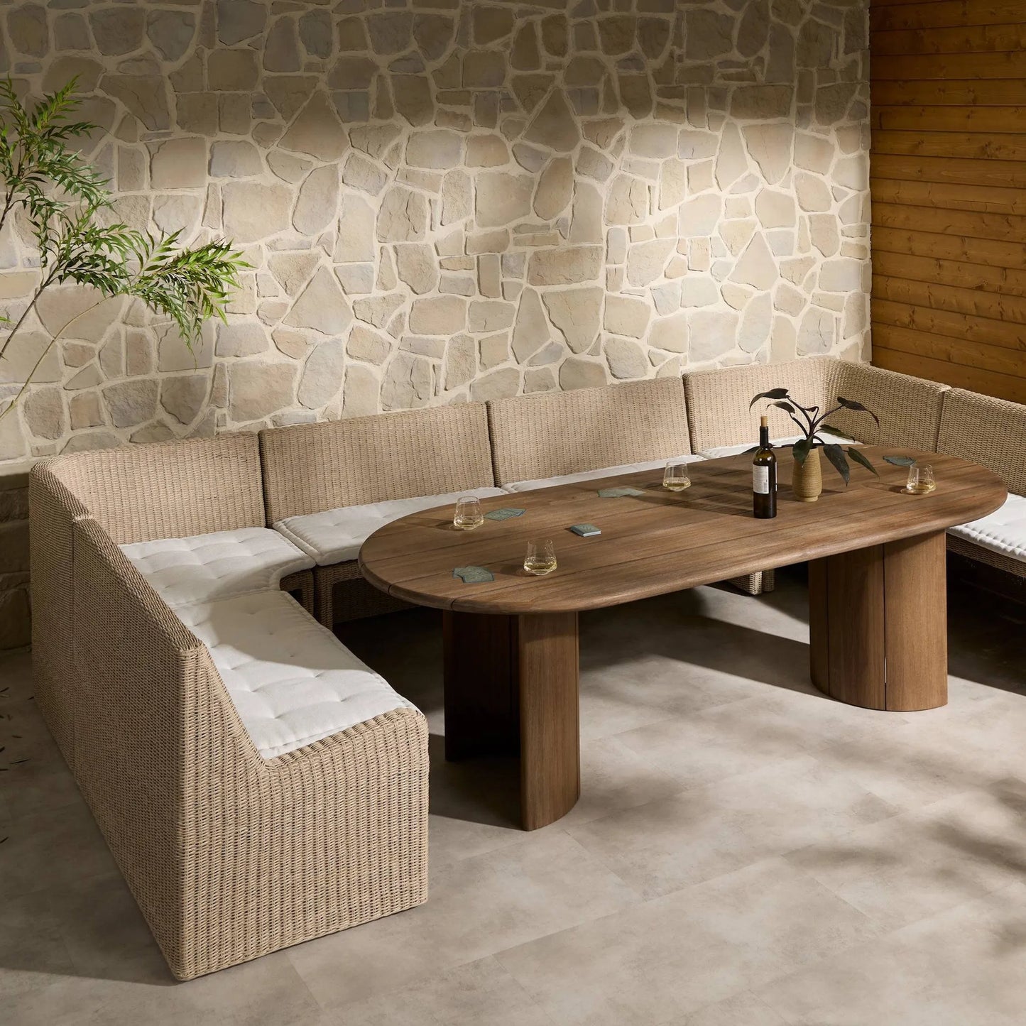 011 SI-2513318,SI-2513319 | Lifestyle | Senna Outdoor Dining Bench by Four Hands in vintage white, alessi linen. Made from 100% polyethylene, 100% polypropylene in a rustic style.