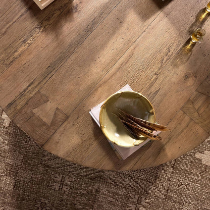 Abaso Round Coffee Table by Four Hands. Made from unique in a unique style.