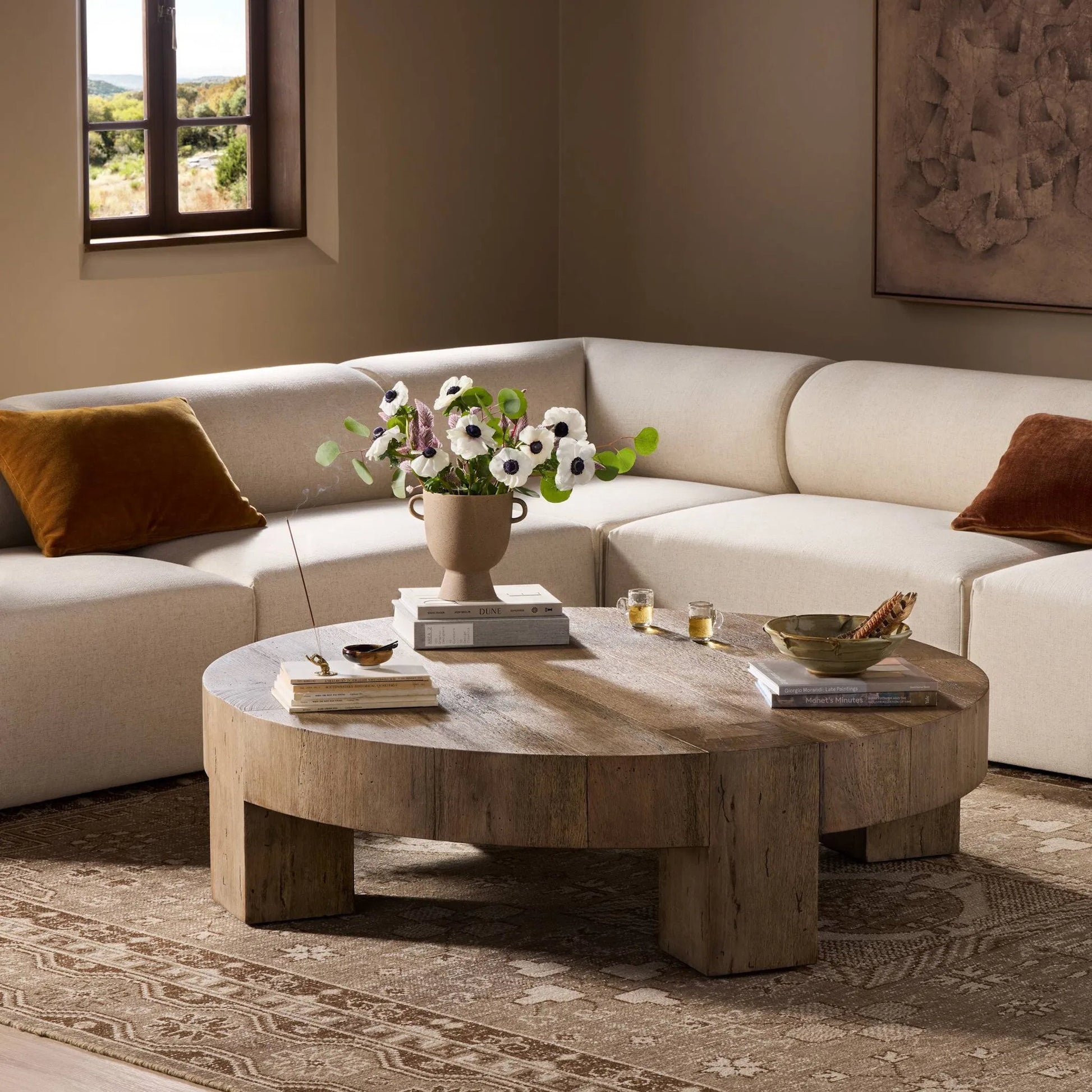 Abaso Round Coffee Table by Four Hands. Made from unique in a unique style.