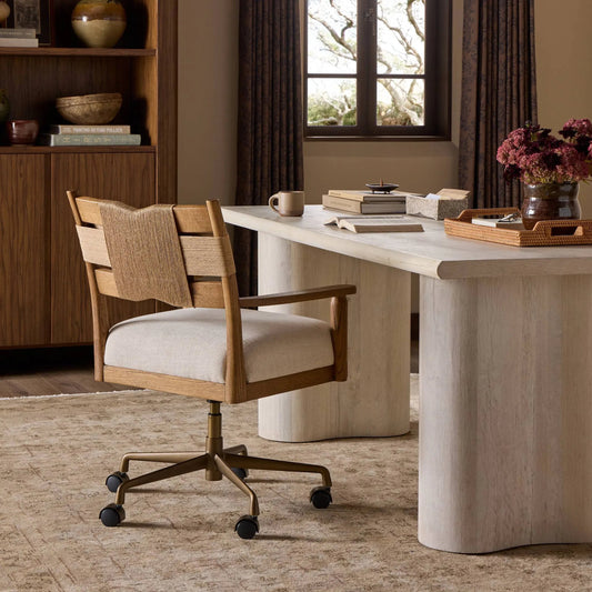 Tova Desk Chair by Four Hands in natural paper cord, brushed brass aluminum, bergamo parchment. Made from rush, aluminum, 75% cotton, 25% flax/linen in a unique style.