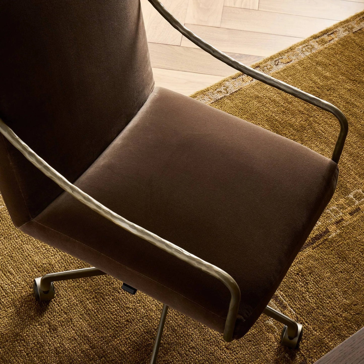006 SI-2635222 | Closeup | Alonzo Desk Chair by Four Hands in surrey mink, warm nickel, hammered warm nicklel. Made from 76.8% cotton, 23.2% polyester, iron in a unique style.