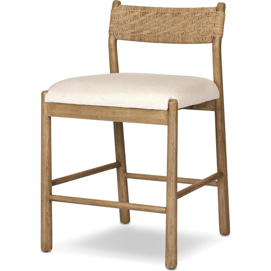 Raynor Counter Stool by Four Hands in lynchart sand, natural mindi, natural agel. Made from 85% polyester, 15% flax/linen, solid mindi, sugar palm in a unique style.