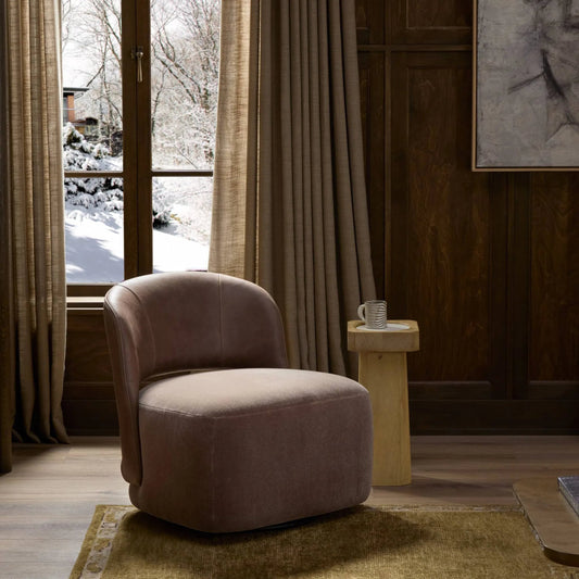 Andrina Swivel Chair by Four Hands in monte mushroom, palermo cigar. Made from 50% viscose, 50% wool, top grain leather in a transitional style.