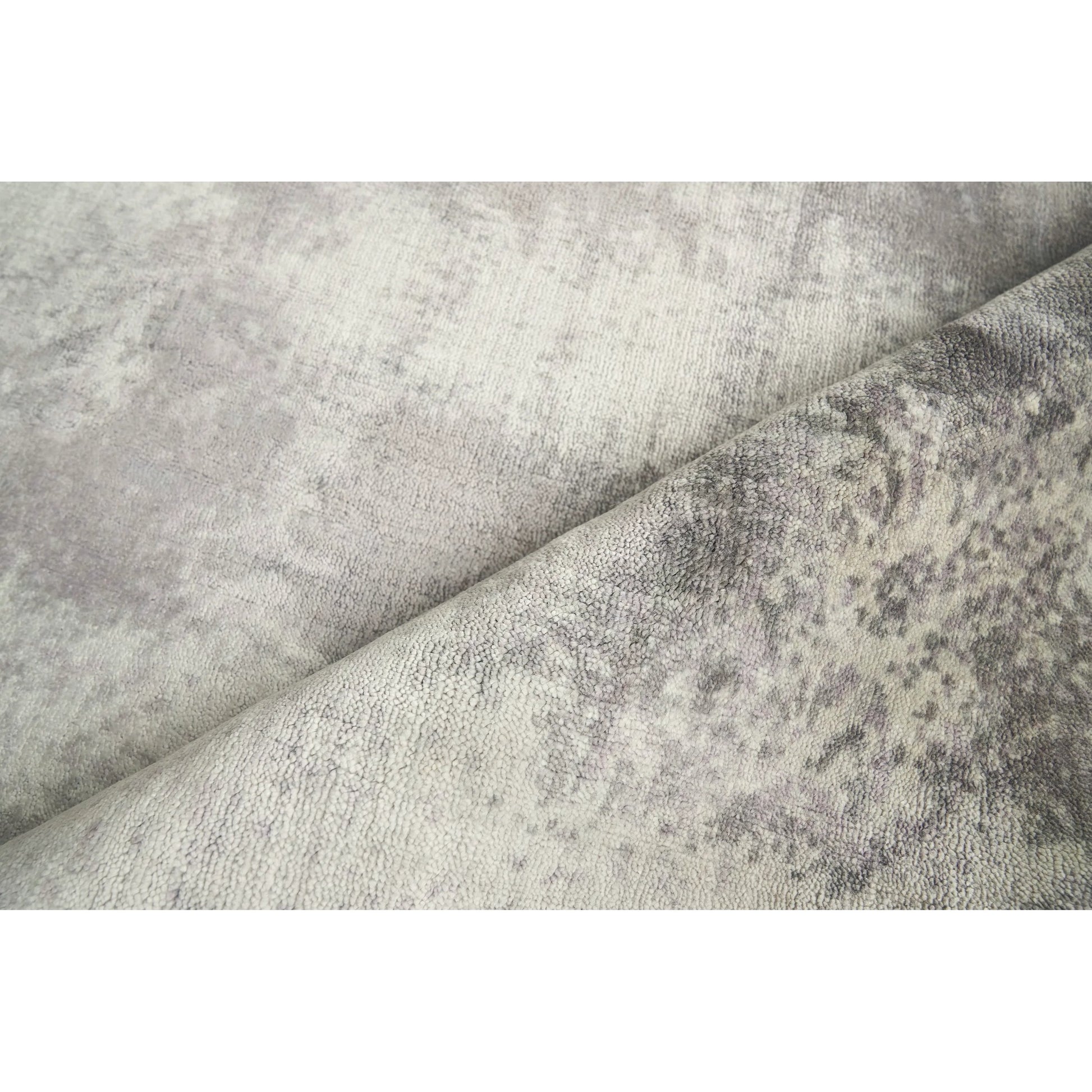 Antolini Area Rug by Exquisite Rugs in gray. Made from bamboo silk in a unique style.