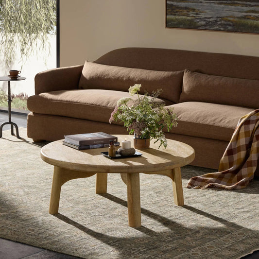 Daley Coffee Table by Four Hands in light natural mango. Made from solid mango in a transitional style.