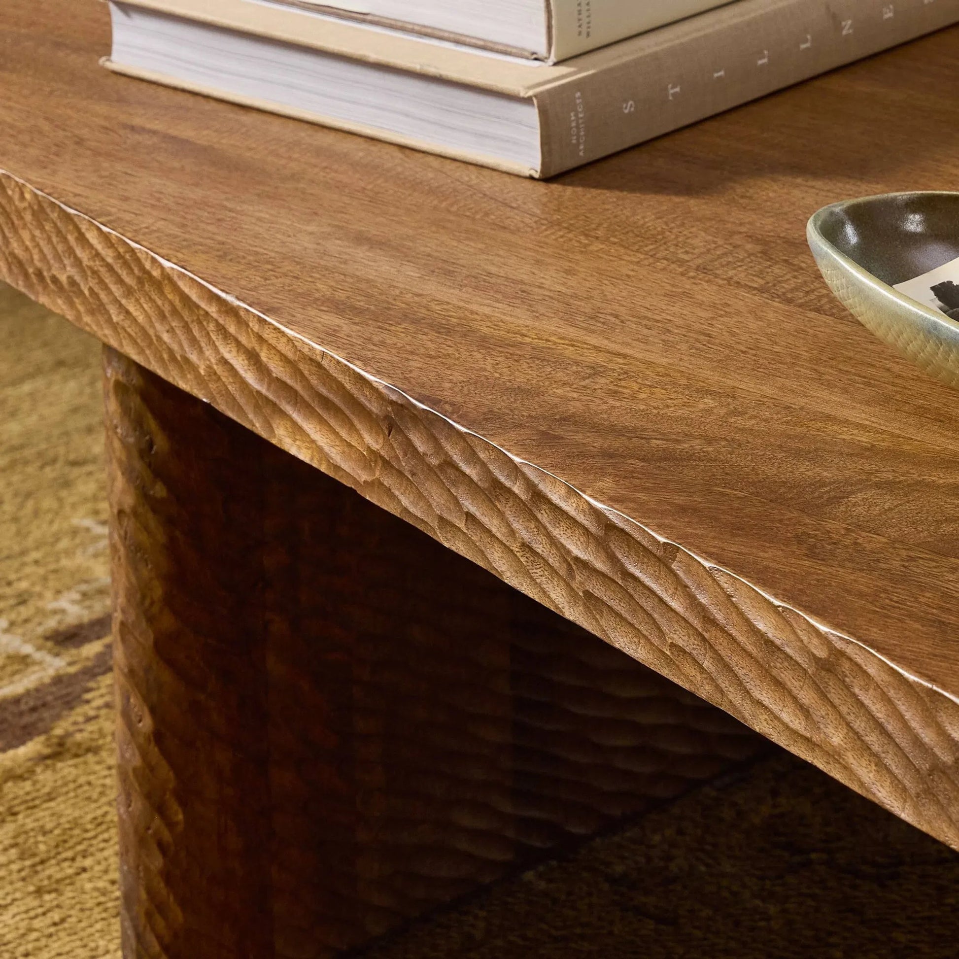 Nella Coffee Table by Four Hands in warm chestnut, carved warm mango. Made from solid mango in a unique style.