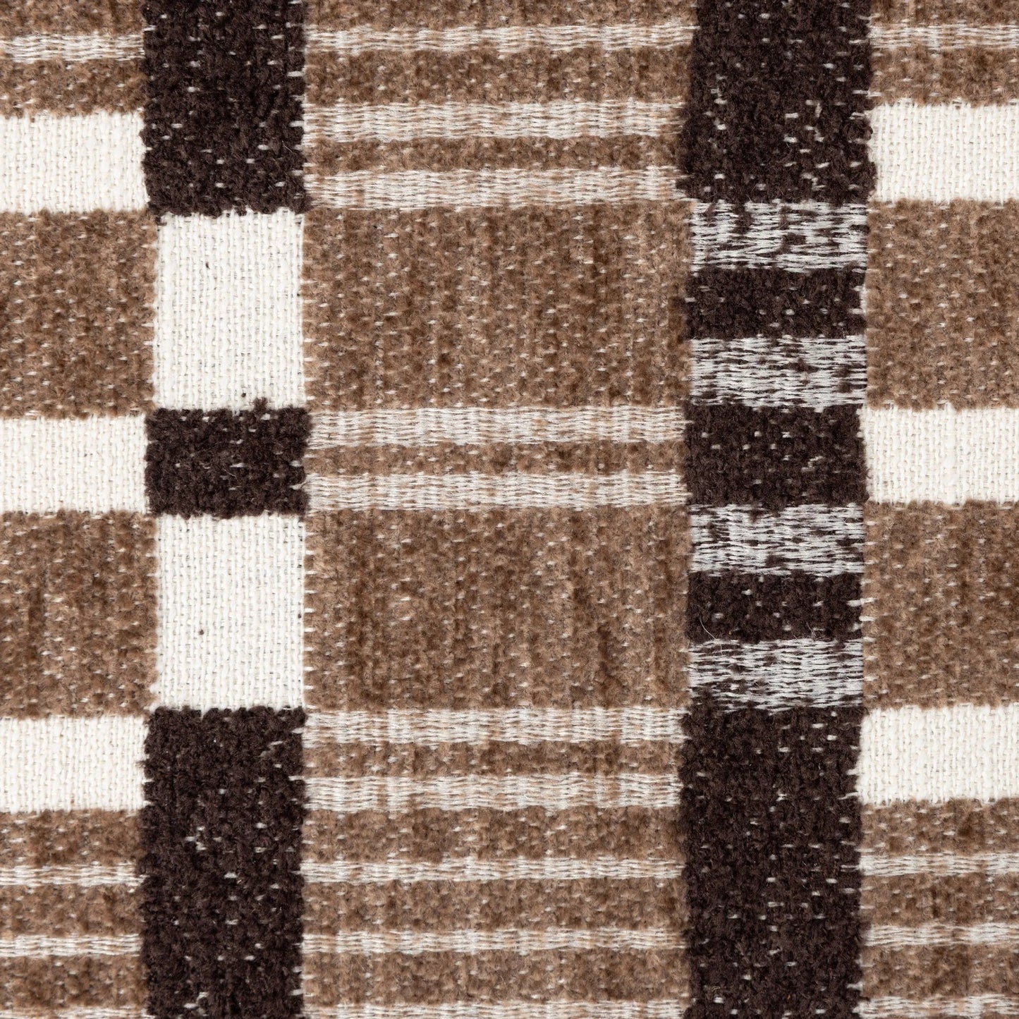 003 SI-2635229 | Closeup | Landrea Accent Stool by Four Hands in sandhill cocoa, smoked black, smoked black veneer. Made from 100% polyester, solid oak, thick oak veneer in a unique style.