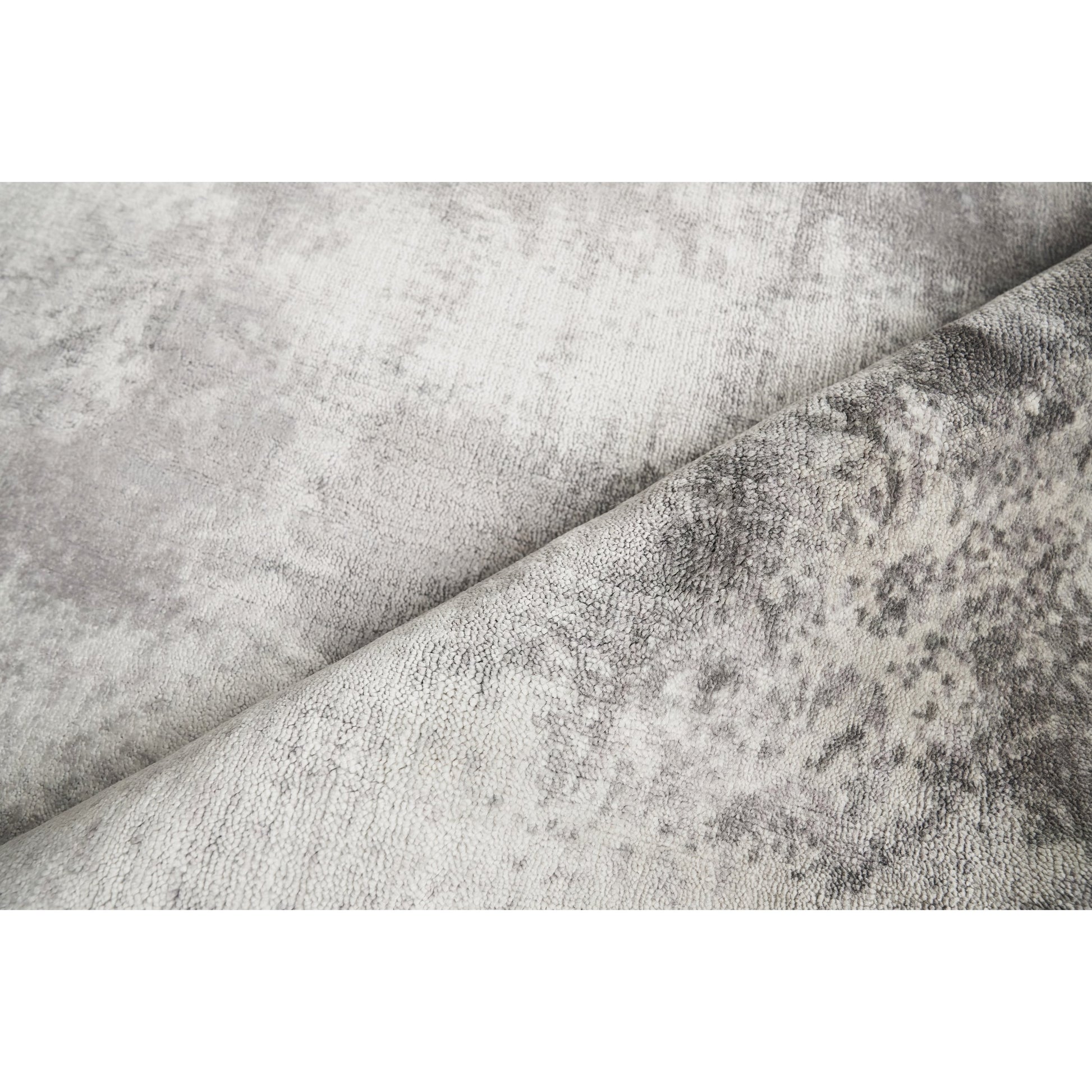 Antolini Area Rug by Exquisite Rugs in gray. Made from bamboo silk in a unique style.