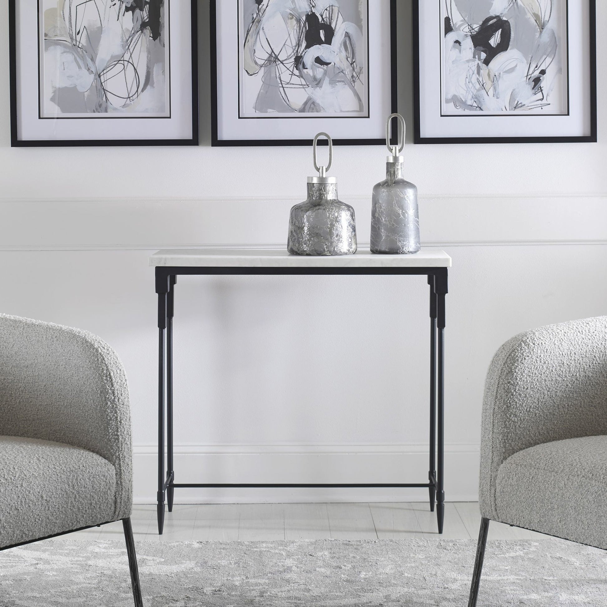 Bourges Console Table by Uttermost in white, satin black. Made from marble, iron in a transitional style.