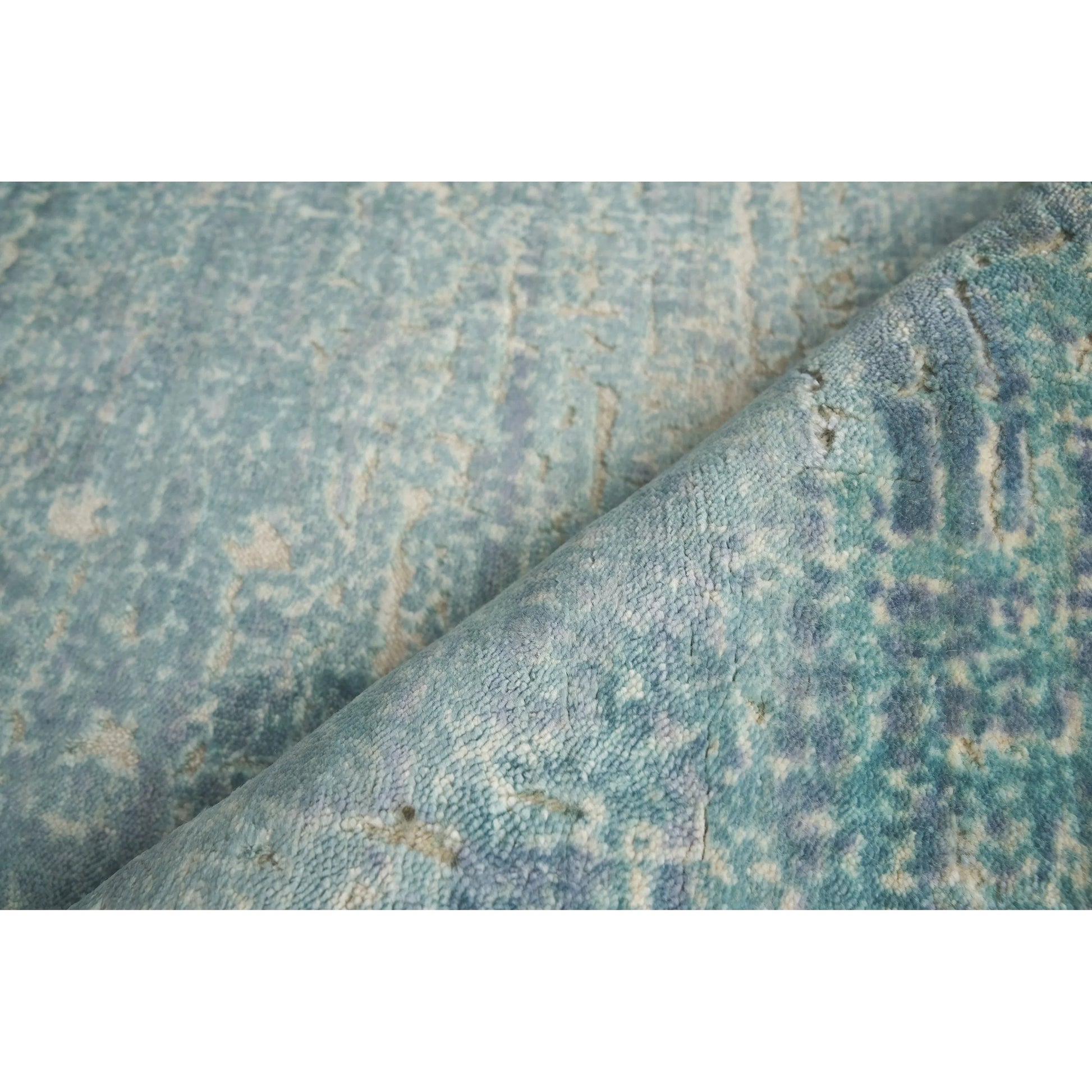 Reflections 2517 Rug by Exquisite Rugs in teal. Made from bamboo silk in a unique style.