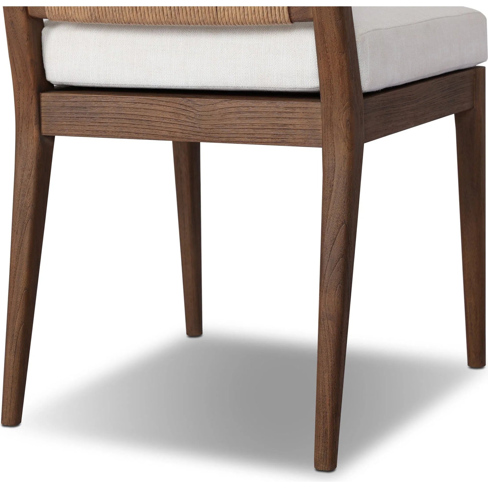 Rothler Outdoor Dining Chair by Four Hands in vergo cream, stained toasted brown-fsc, textured sand. Made from 100% polyester, solid fsc®-certified teak, 100% polyethylene in a unique style.