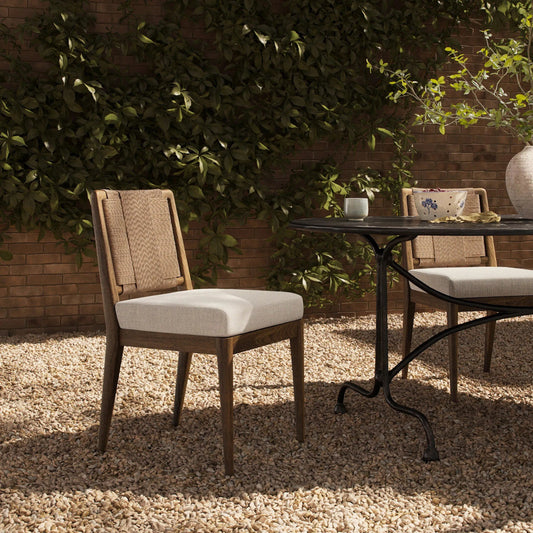 Rothler Outdoor Dining Chair by Four Hands in vergo cream, stained toasted brown-fsc, textured sand. Made from 100% polyester, solid fsc®-certified teak, 100% polyethylene in a unique style.