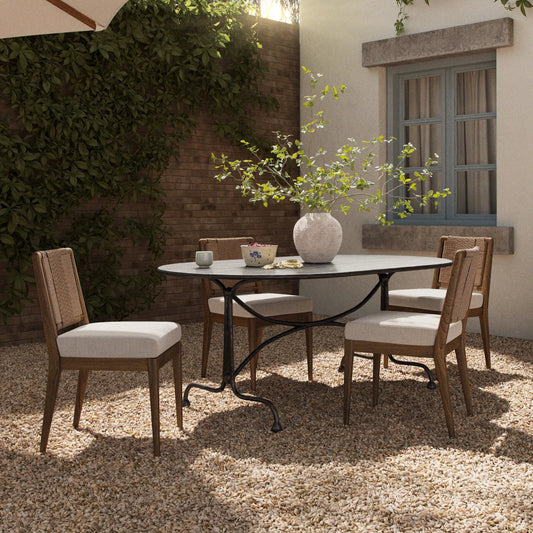 Lenoir Outdoor Dining Table-76" by Four Hands in distressed bronze. Made from aluminum in a unique style.