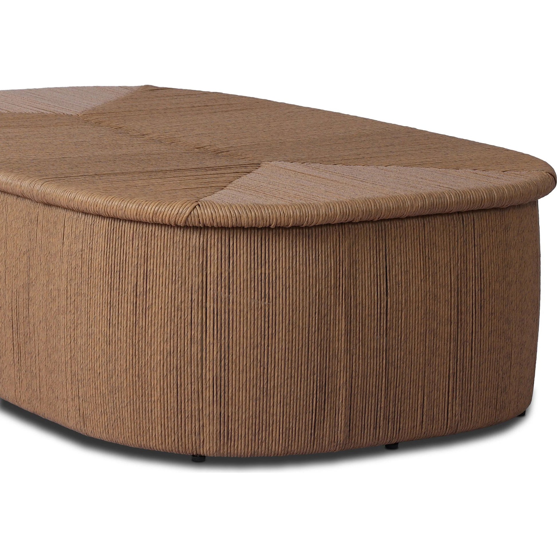 Taum Outdoor Coffee Table by Four Hands in textured sand. Made from 100% polyethylene in a unique style.