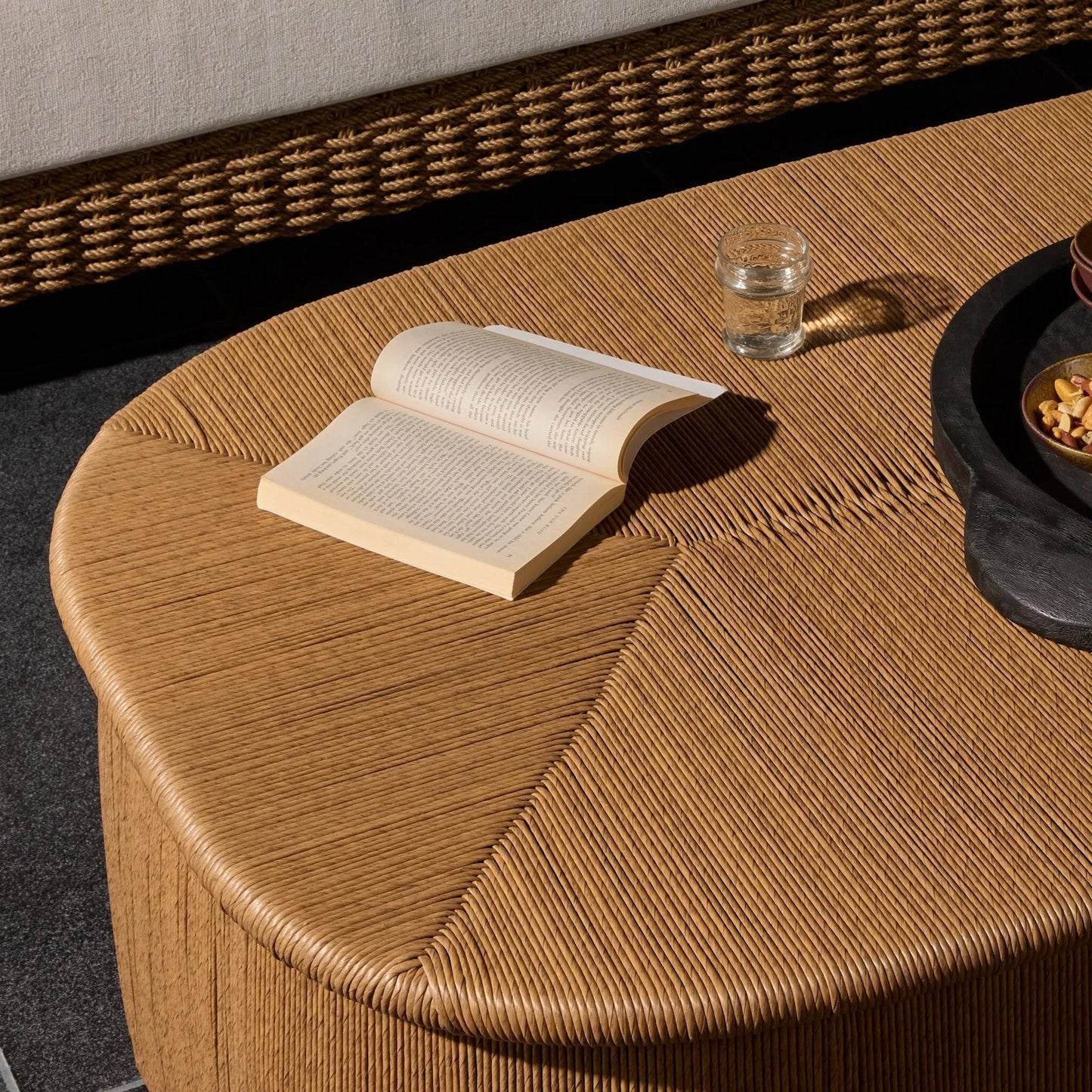 010 SI-2531711 | Closeup | Taum Outdoor Coffee Table by Four Hands in textured sand. Made from 100% polyethylene in a unique style.
