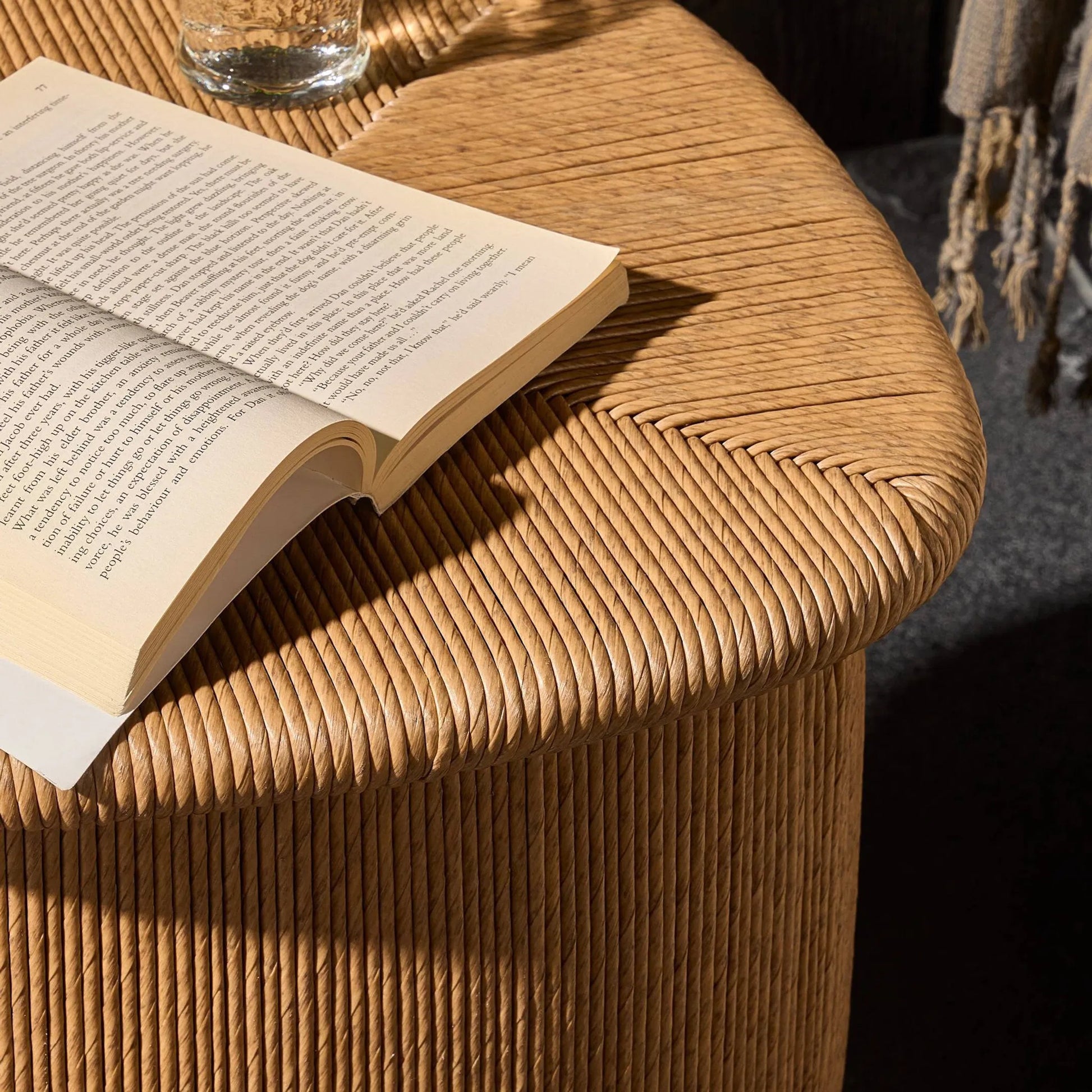 Taum Outdoor Stool by Four Hands in textured sand. Made from 100% polyethylene in a unique style.