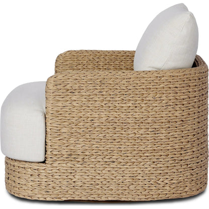 Caney Outdoor Swivel Chair by Four Hands in coastal weave, vergo cream. Made from 100% polyethylene, 100% polyester in a rustic style.