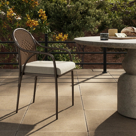 Graciela Outdoor Dining Chair by Four Hands in vergo cream, aged bronze steel, faux dark hyacinth. Made from 100% polyester, steel, 100% polyethylene in a unique style.