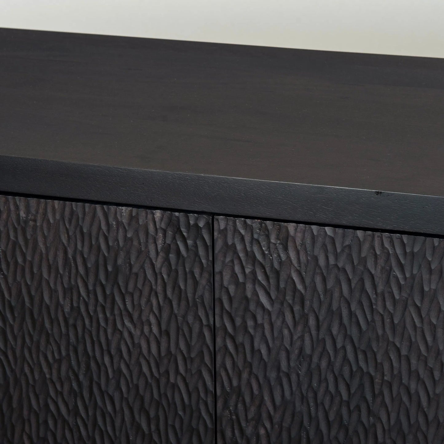 010 SI-2531700 | Closeup | Shevall Sideboard by Four Hands in black wash, carved black mango. Made from solid mango in a unique style.