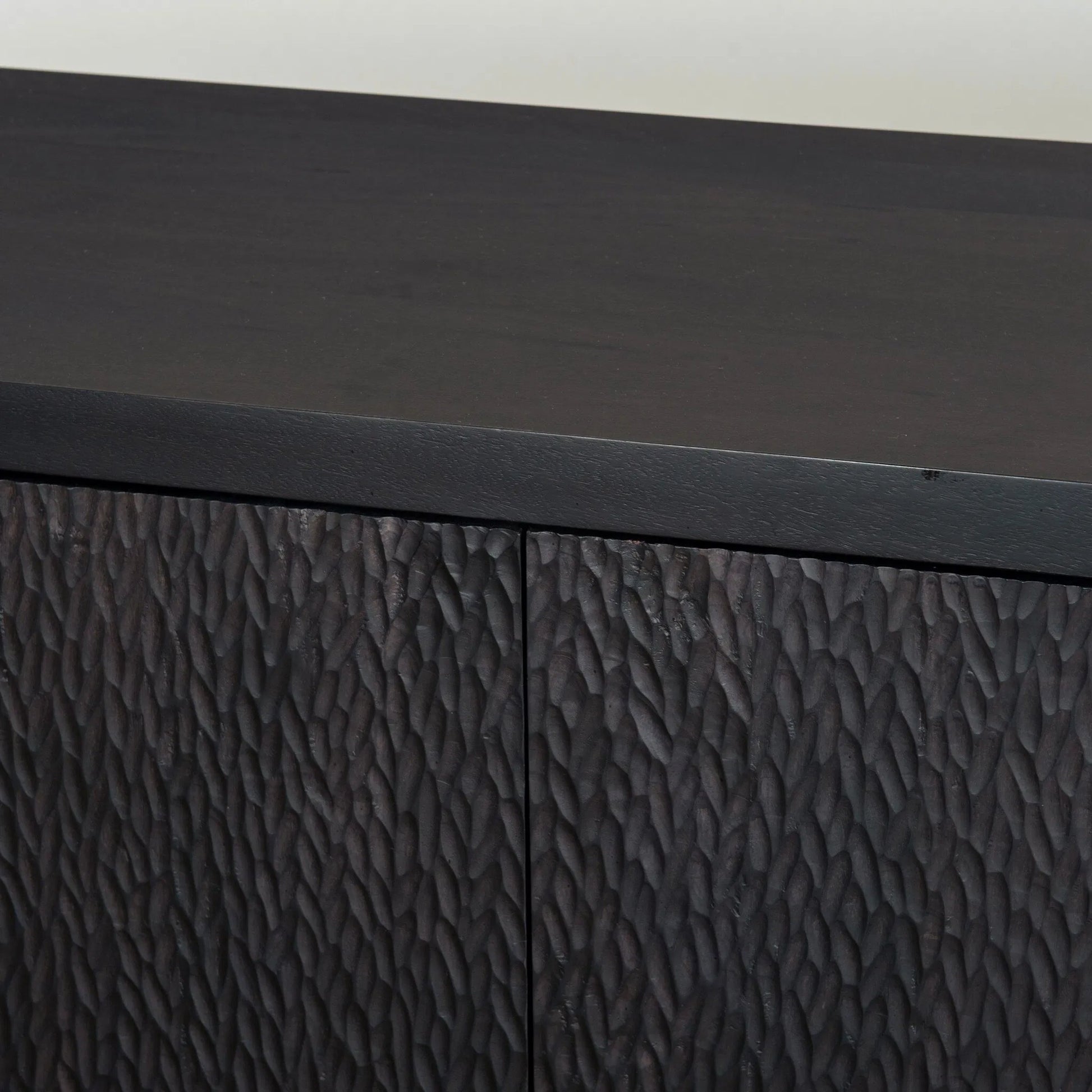 Shevall Sideboard by Four Hands in black wash, carved black mango. Made from solid mango in a unique style.