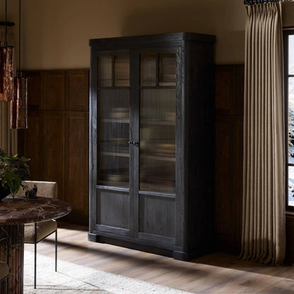 Leopold Cabinet by Four Hands in black hemlock, tempered glass, sandy hemlock. Made from hemlock solid, tempered glass in a unique style.