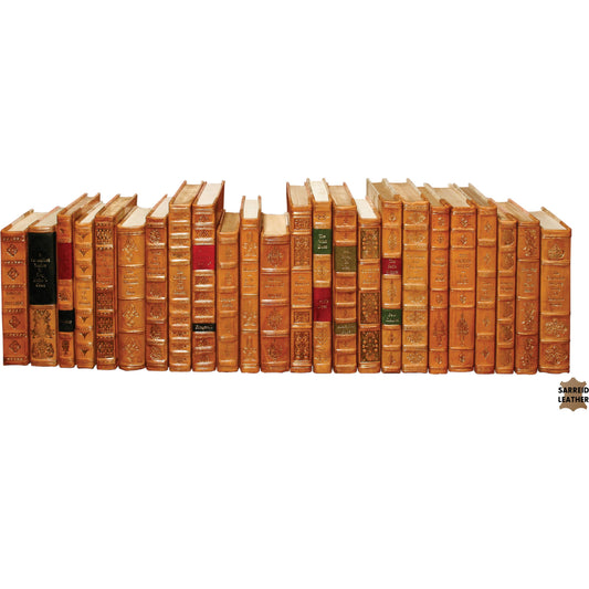Faux Tan Books by Sarreid Ltd. in various and books sewn shut. Made from leather, marble in a traditional style.