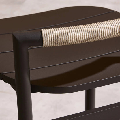 Baden Outdoor Metal Bar Stool by Four Hands in vintage white, bronze. Made from 100% polyethylene, aluminum in a unique style.