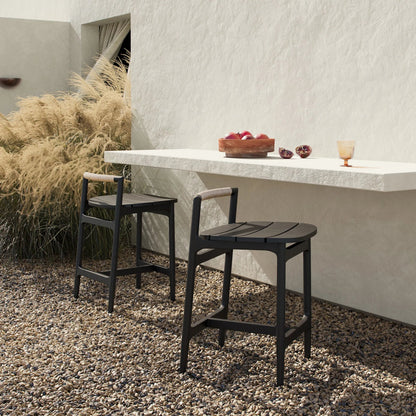 Baden Outdoor Metal Counter Stool by Four Hands in vintage white, bronze. Made from 100% polyethylene, aluminum in a transitional style.
