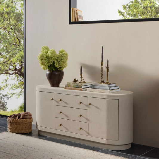 Amelia Media Console by Four Hands in light antique brass, ivory painted linen. Made from steel, painted linen in a unique style.