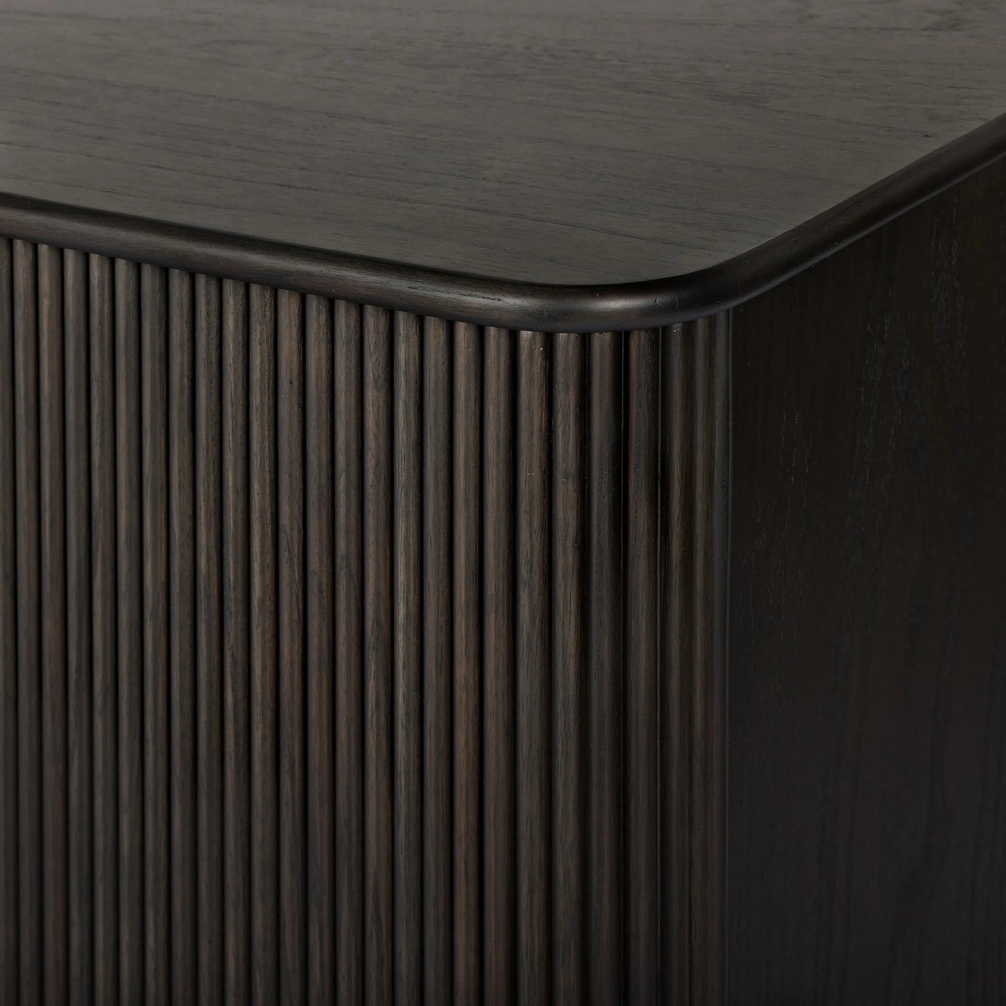 022 SI-2635234 | Closeup | Ona Media Console by Four Hands in smoked black mindi, smoked black mindi veneer. Made from solid mindi, mindi veneer in a transitional style.