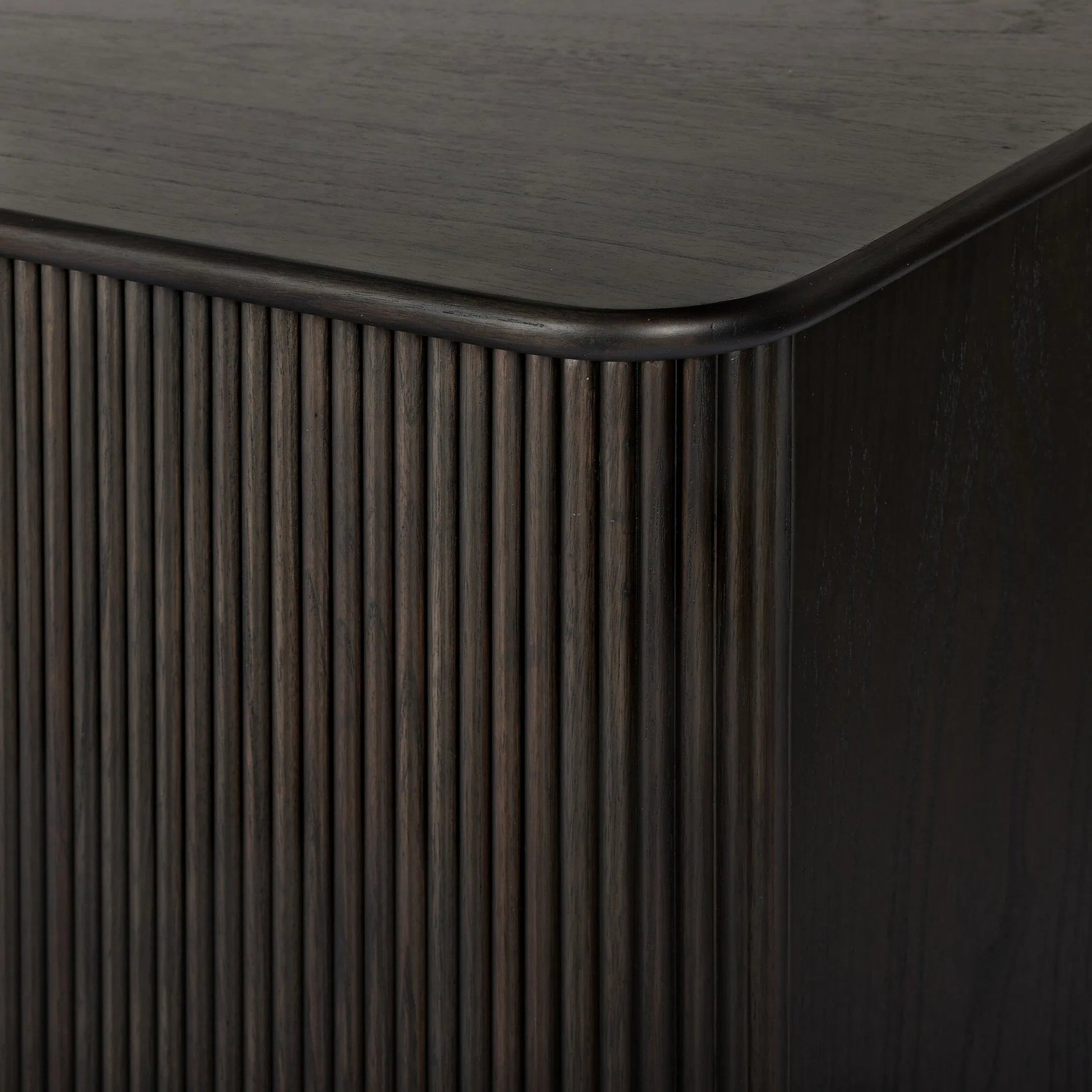 Ona Media Console by Four Hands in smoked black mindi, smoked black mindi veneer. Made from solid mindi, mindi veneer in a transitional style.
