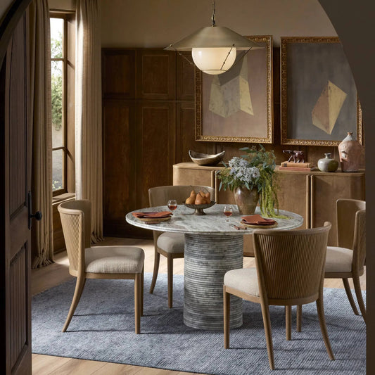 Reeves Dining Table by Four Hands in river grey marble. Made from solid marble in a unique style.