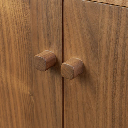 Arturo 4 Door Sideboard by Four Hands in natural walnut, natural walnut veneer. Made from solid walnut, walnut veneer in a transitional style.