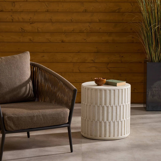 Callisto Outdoor End Table by Four Hands in aged white concrete. Made from solid concrete in a unique style.