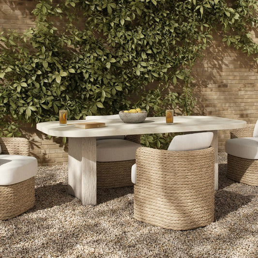 Alessandro Outdoor Dining Table-86" by Four Hands in smooth quarried cream concrete. Made from solid concrete in a unique style.